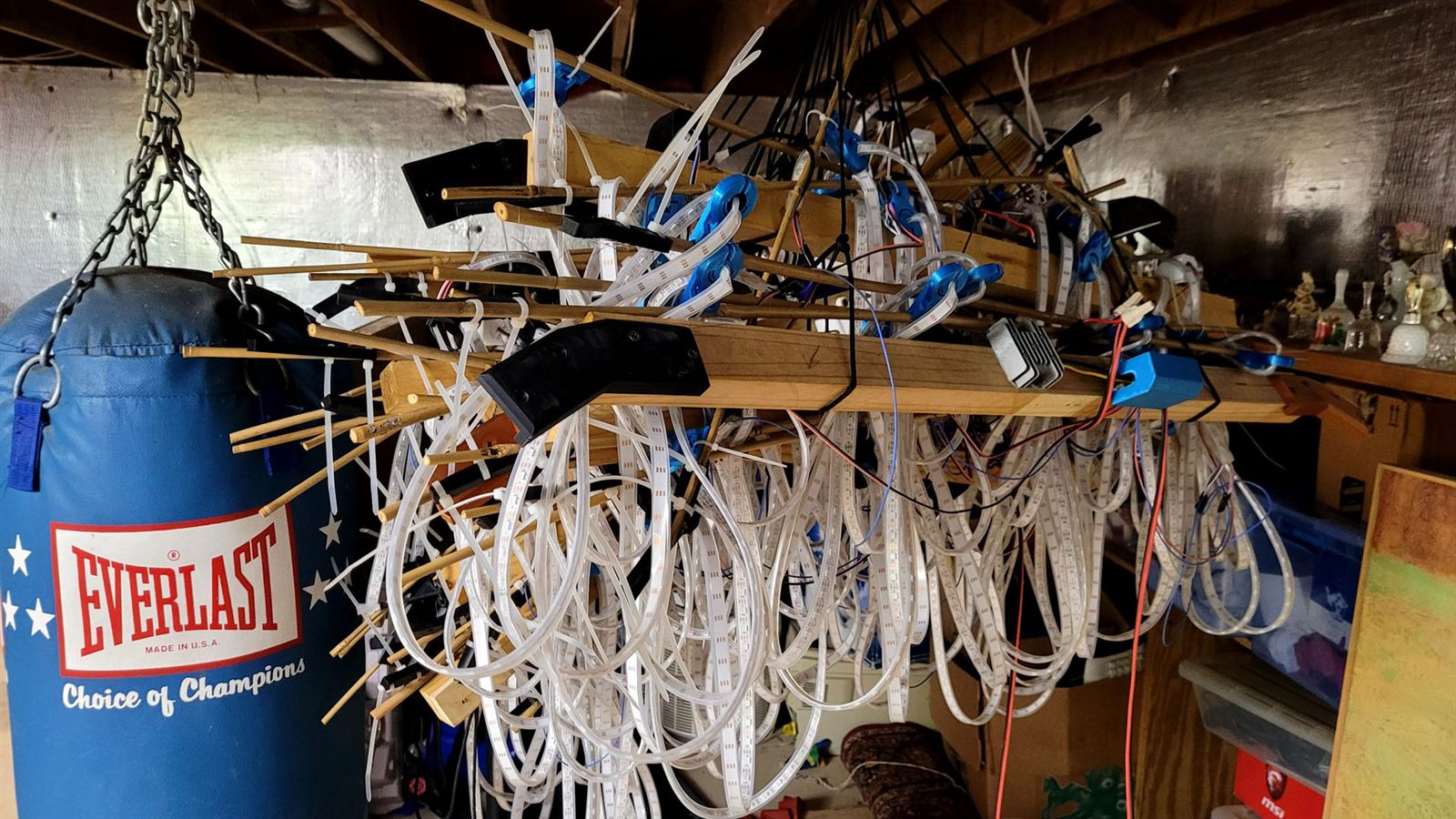 The dismantled ring hanging bundled from the basement ceiling